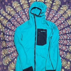 Patagonia Aqua Blue Hooded Jacket with Navy Accents